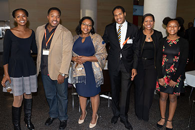 alumni and students posed together at a Law Reunion reception