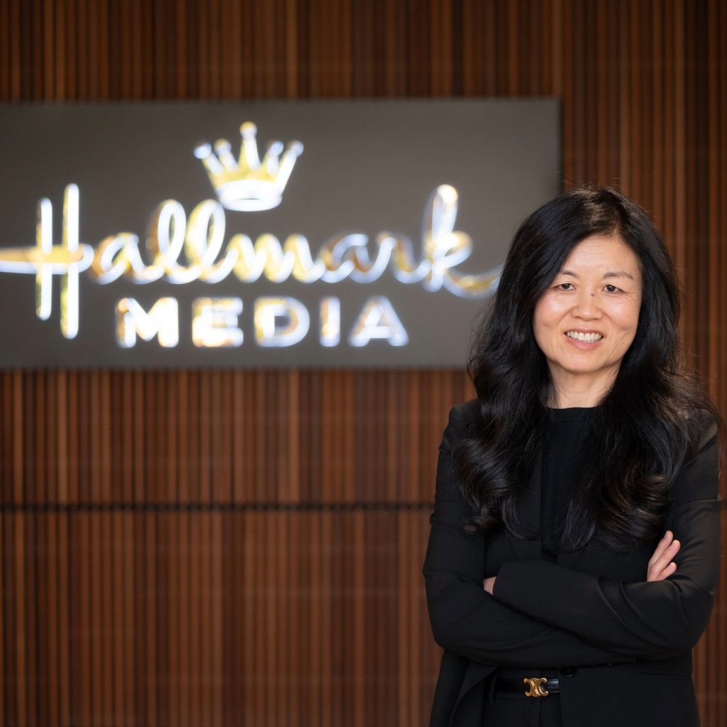 Leslie Park stands in front of the Hallmark Media sign in her L.A. office.