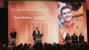 Kevin Belbey ’13, G’16, L’16 speaking at podium at Generation Change Awards