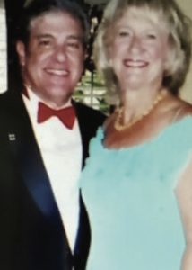 Photo of Giuseppe Vincenzo ”Joe” Vumbacco L’70 and a woman
