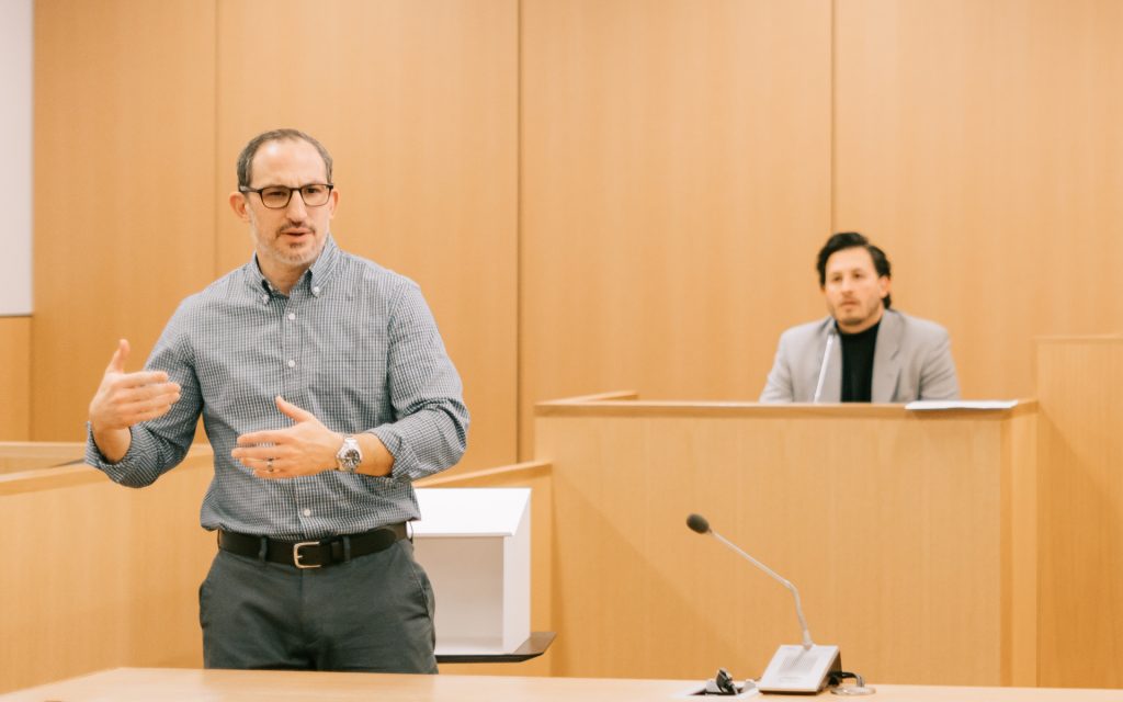 Professor Todd Berger and Adjunct Instructor Raul Velez teach class in the courtroom
