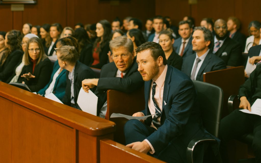 People sitting in a courtroom