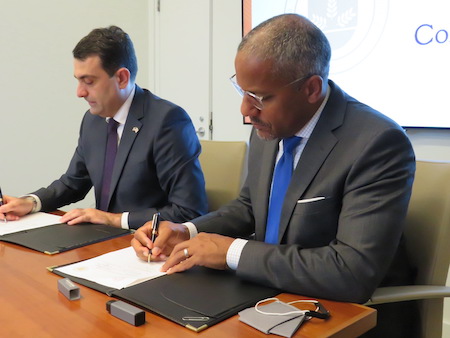 Dean Craig M. Boise (right) and Georgian Bar Association (GBA) President David Asatiani sign a September 2021 Memorandum of Understanding to promote scholarly exchange and cooperation among Syracuse Law, Syracuse University, and GBA.