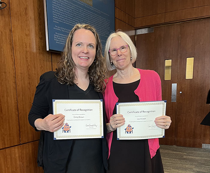 Professors Emily Brown and Laura Lape Accept Awards