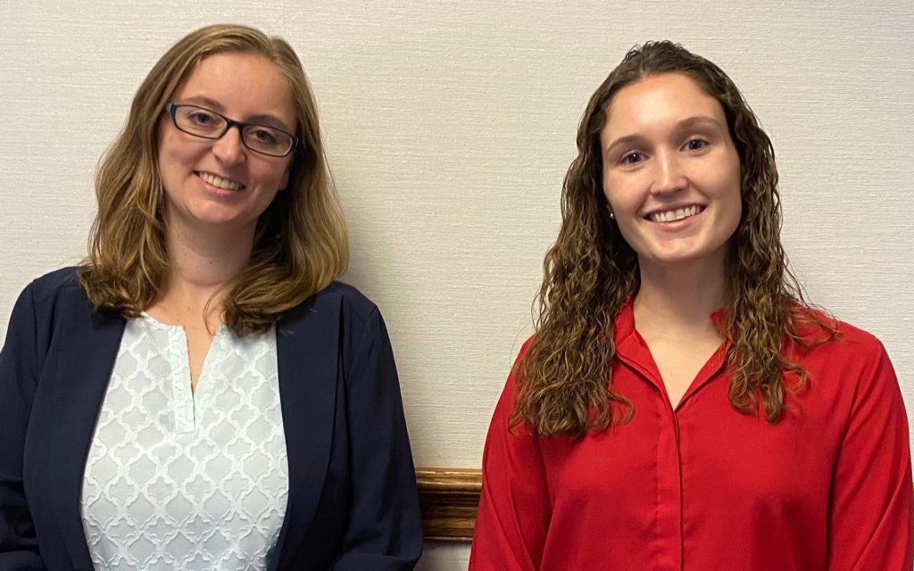 Erin Lafayette L’13 (left) pictured with a member of the SU College of law