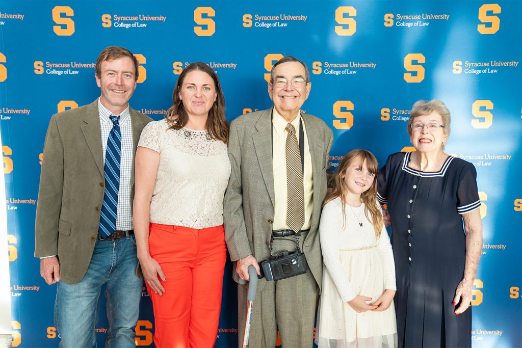 J. Neil Huber L’68 poses with his family before the award ceremony.