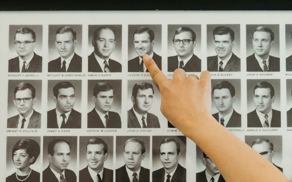 Erica points to President Joe Biden in the composite photos