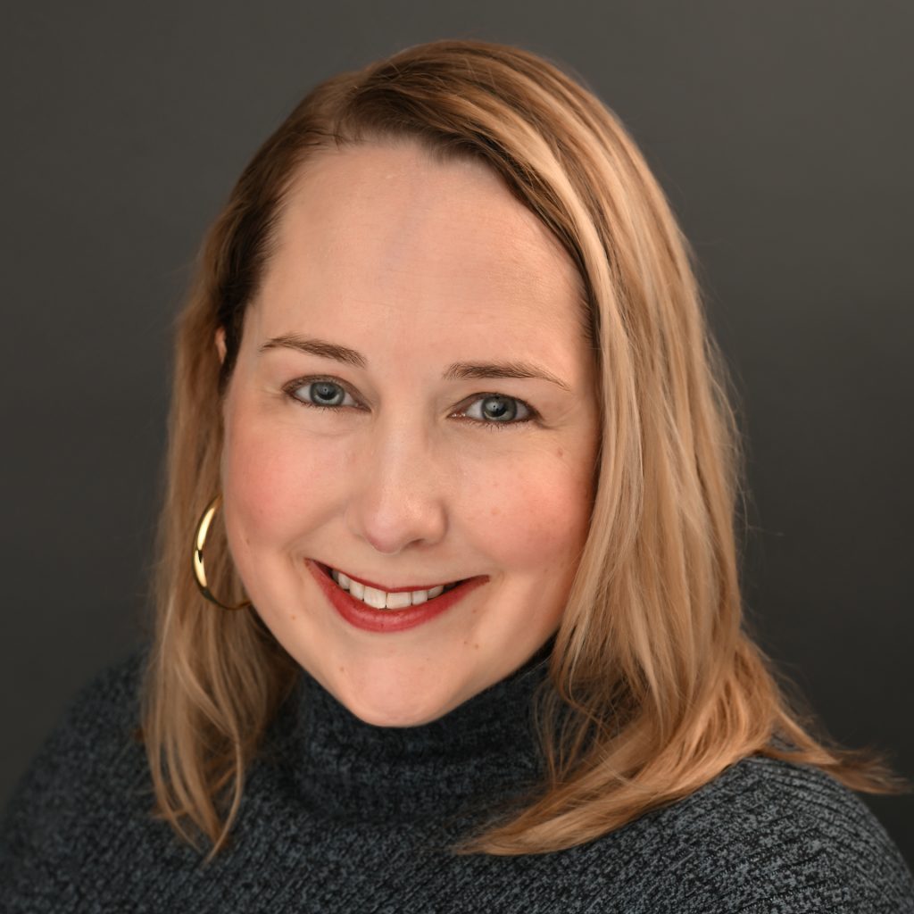 headshot of katherine macfarlane smiling at the camera