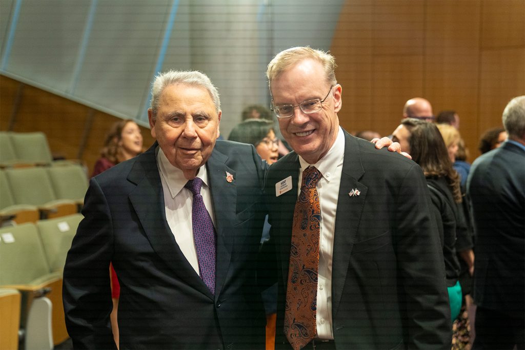 Bernie Kossar ’53, L’55 and Syracuse University Chancellor Kent Syverud pose for a photo after the ceremony.