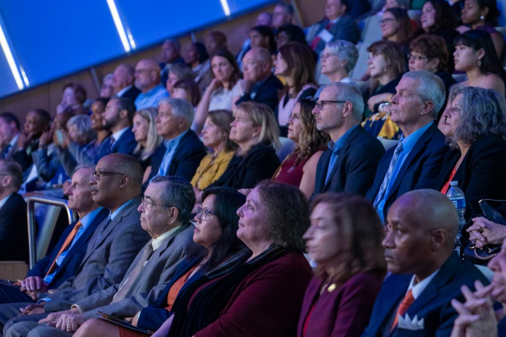 The audience watches as the 2023 Syracuse University College of Law Awards are presented.