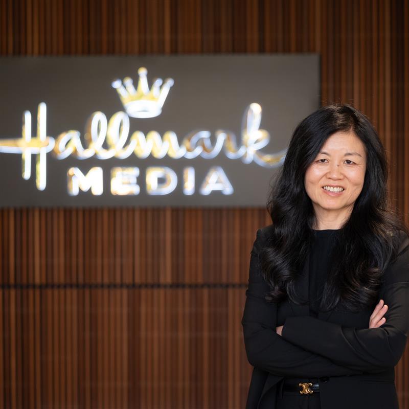 Leslie Park stands in front of the Hallmark Media sign in her L.A. office.