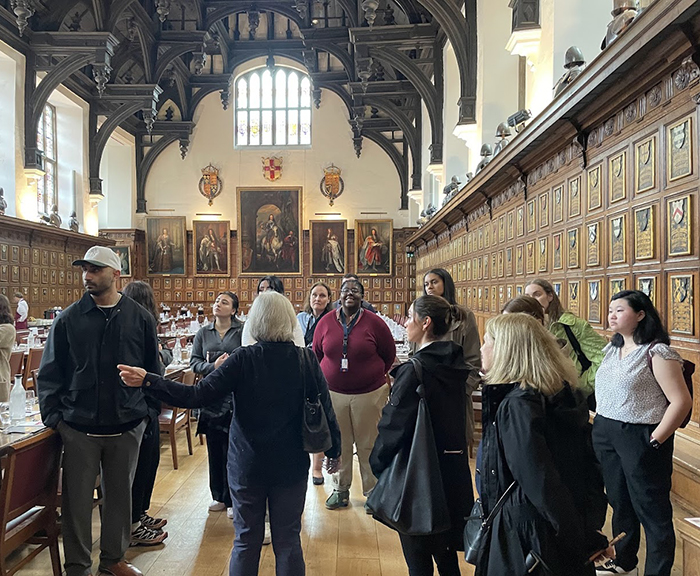 Group of students in the LondonEx program tours Middle Temple Hall