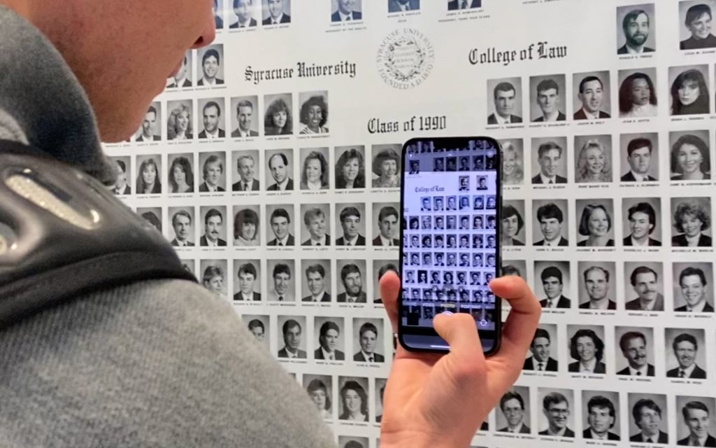 Luke finds his mom on the composite images during admitted students day when he first came to visit the College of Law 