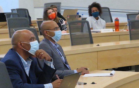 PJ Jayachandran L’98 (second from left) listens to student presentation during his “The Corporate Lawyer in a Sustainable World” course for JDinteractive residency students in August 2021.