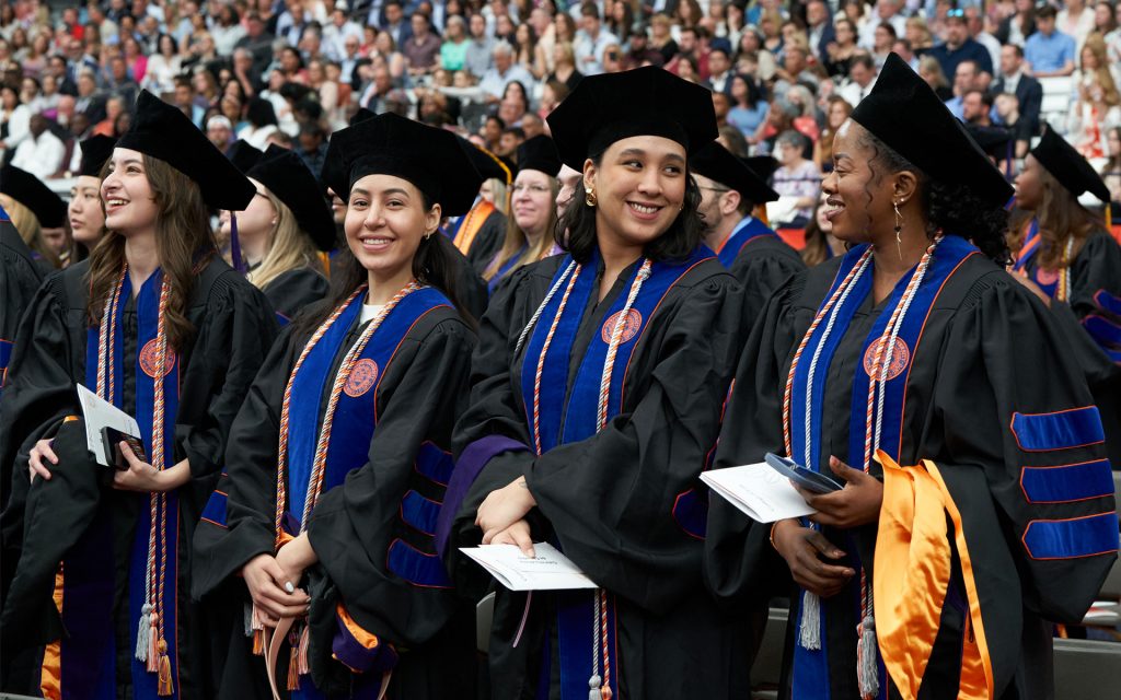Students gather in their caps and gowns during the 2024 commencement ceremony