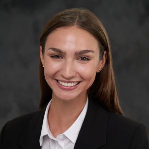 Headshot of Kate Turner in front of a gray background