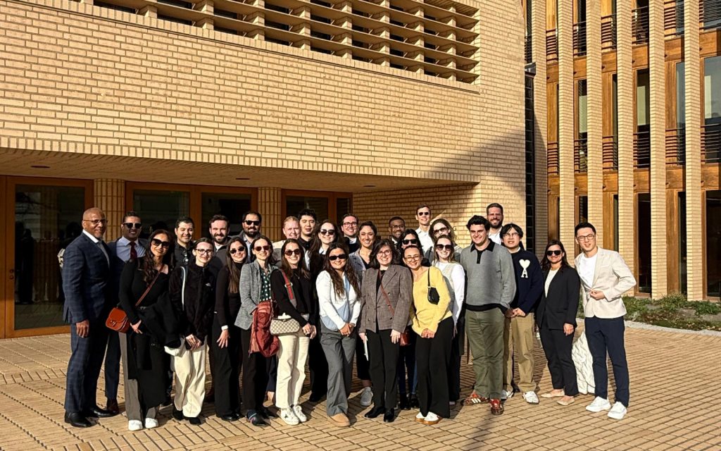 Syracuse Law students in a group photo outside building in Switzerland