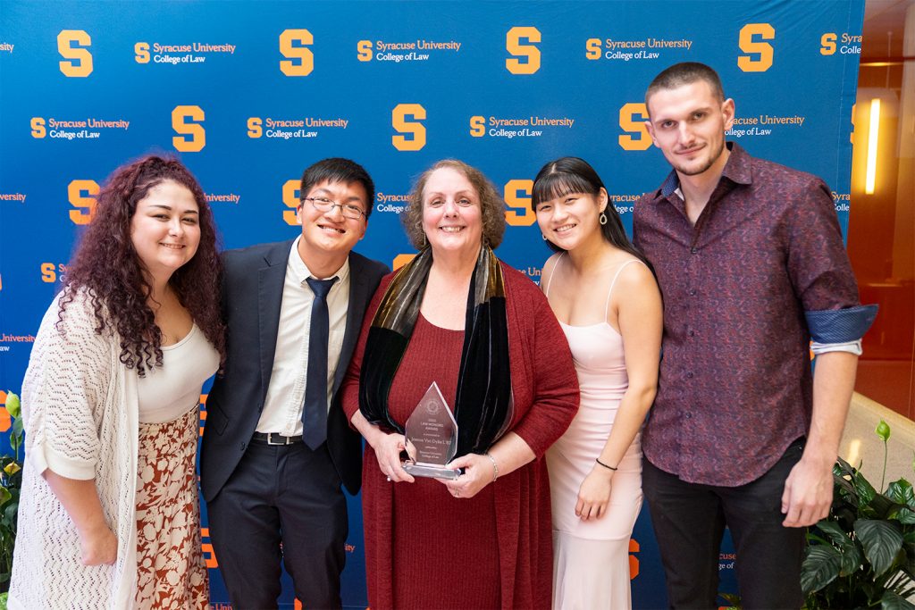 Joanne Van Dyke L’87 and her family with her Law Honors award