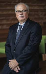 Headshot of Robert M Hallenbeck L'83