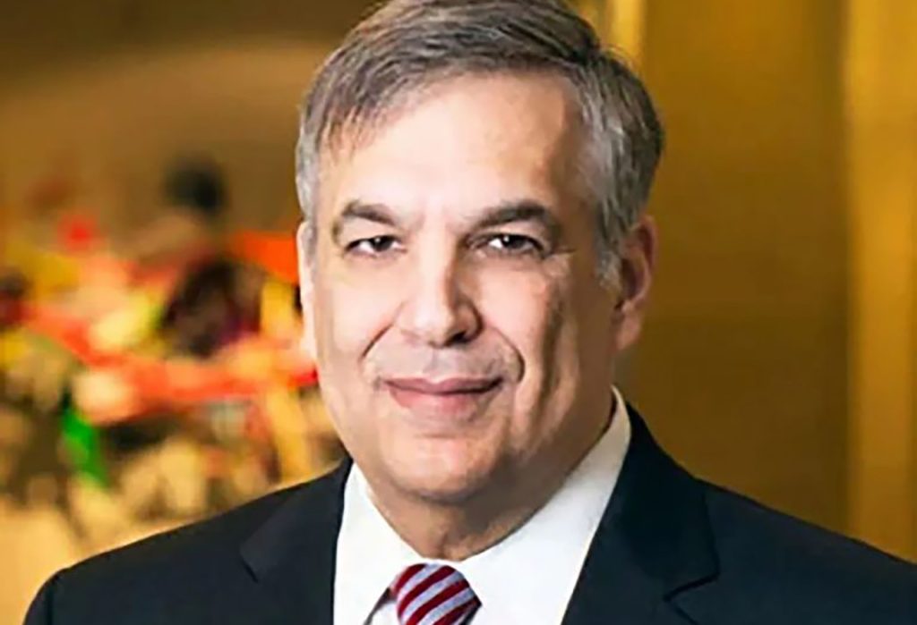 Headshot of Richard Alexander wearing a suit